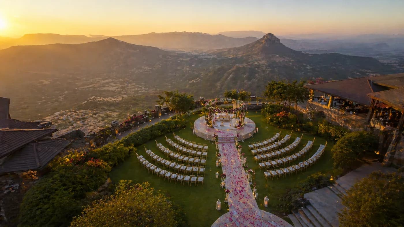 Lonavala hilltop wedding venue with monsoon greenery and outdoor mandap setup
