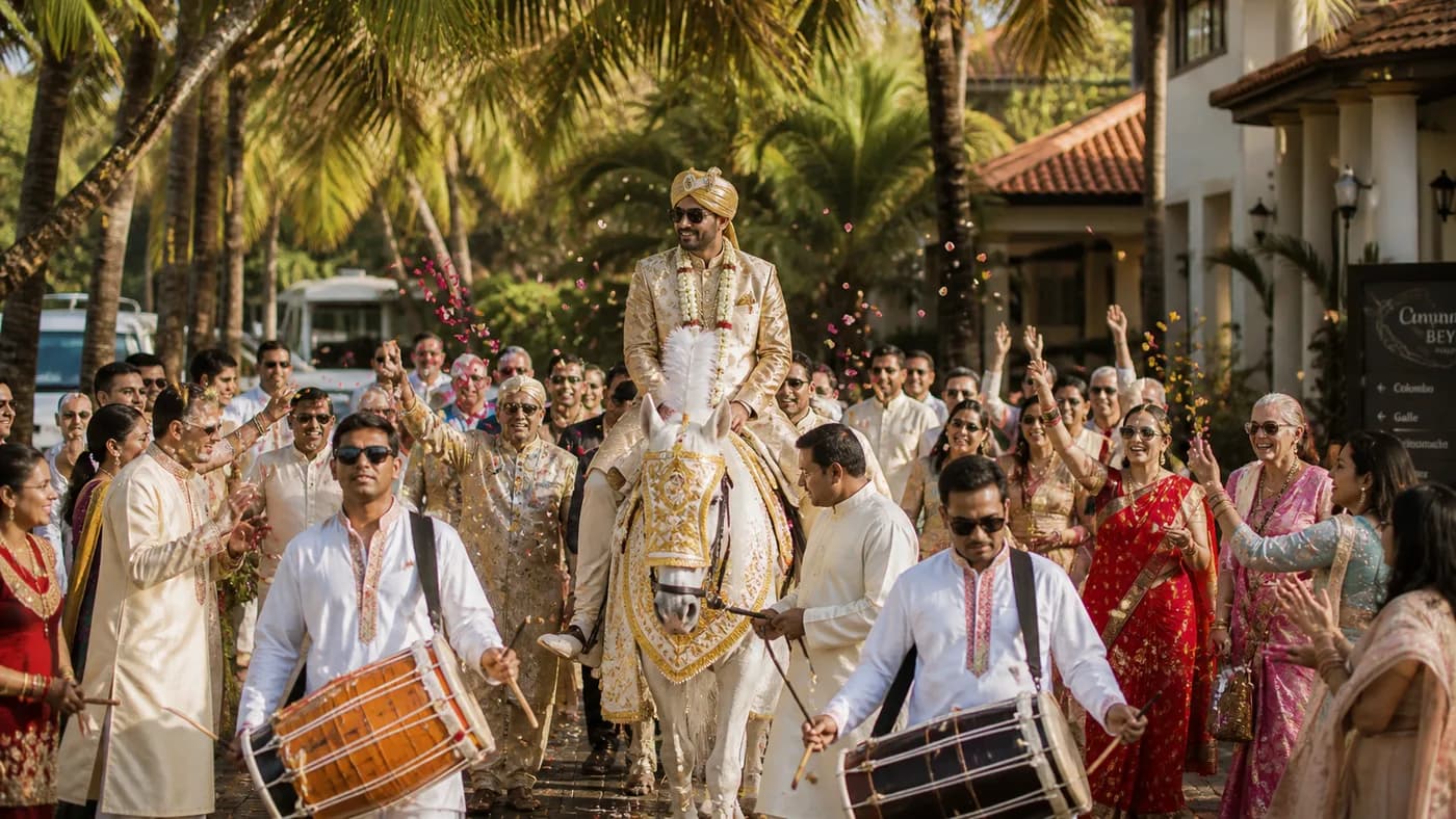 Indian baraat procession at Cinnamon Bey Beruwala with groom on a horse and dhol players