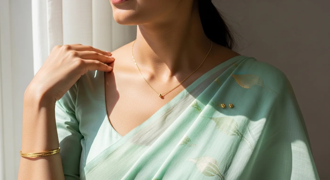 Minimalist gold bridal jewellery set with sleek chain necklace and small stud earrings for a day wedding